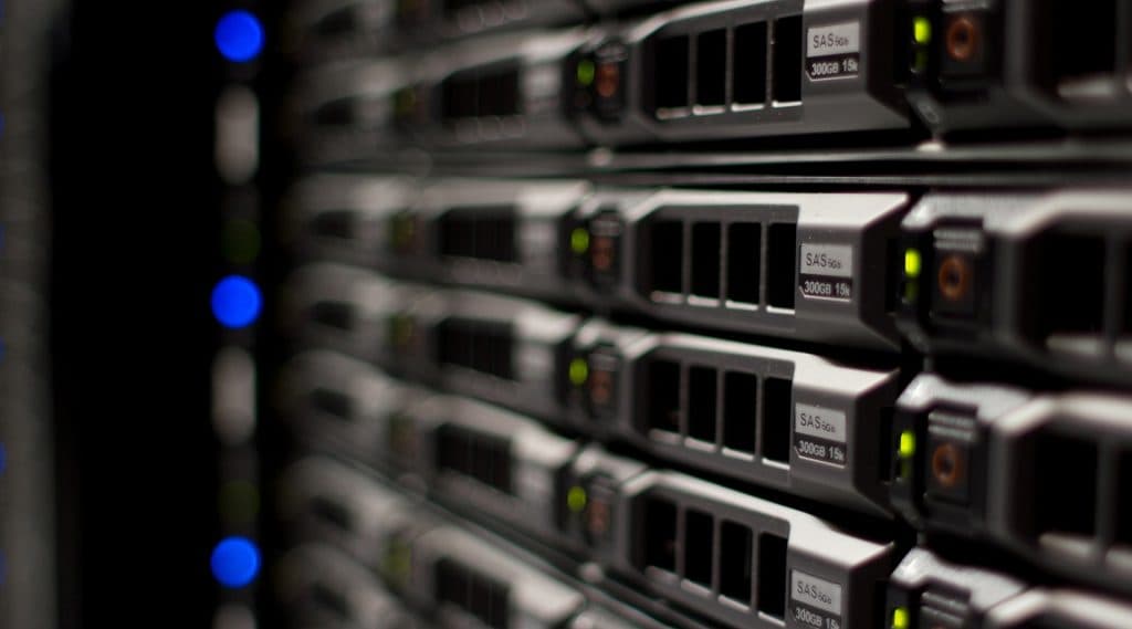 Close-up of a server cabinet with active hardware
